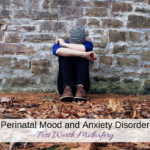 woman up against the wall sitting with her head in her arms with the caption "Perinatal mood and anxiety disorder"