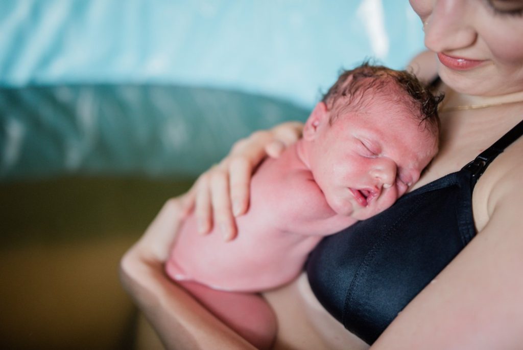 Hypnobirthing baby and mom in birth pool